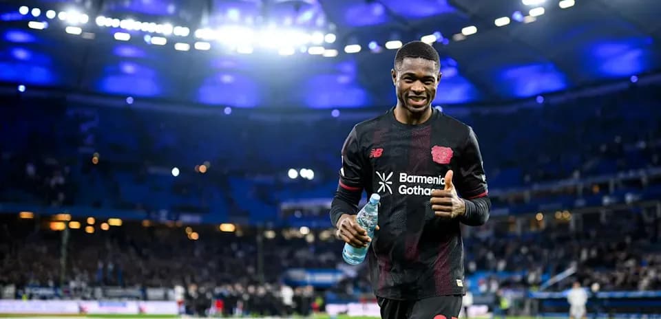 Player celebrating with water bottle on field