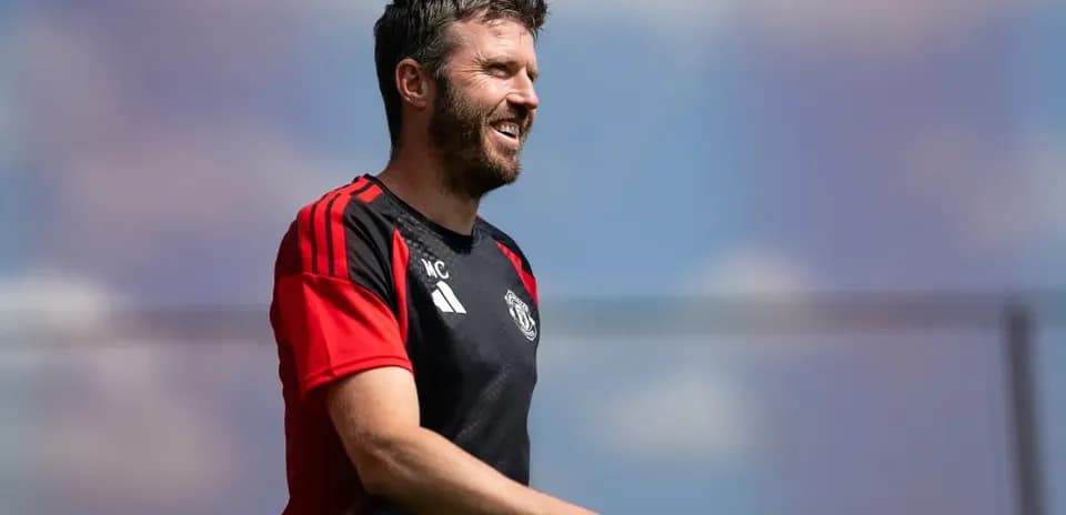 Coach walking during training session at sunny day