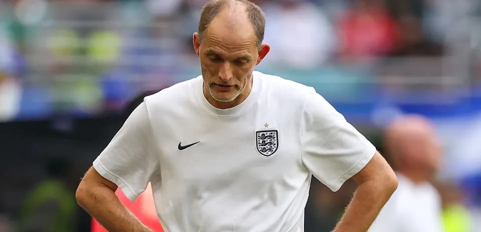 Coach with head down during match reflection