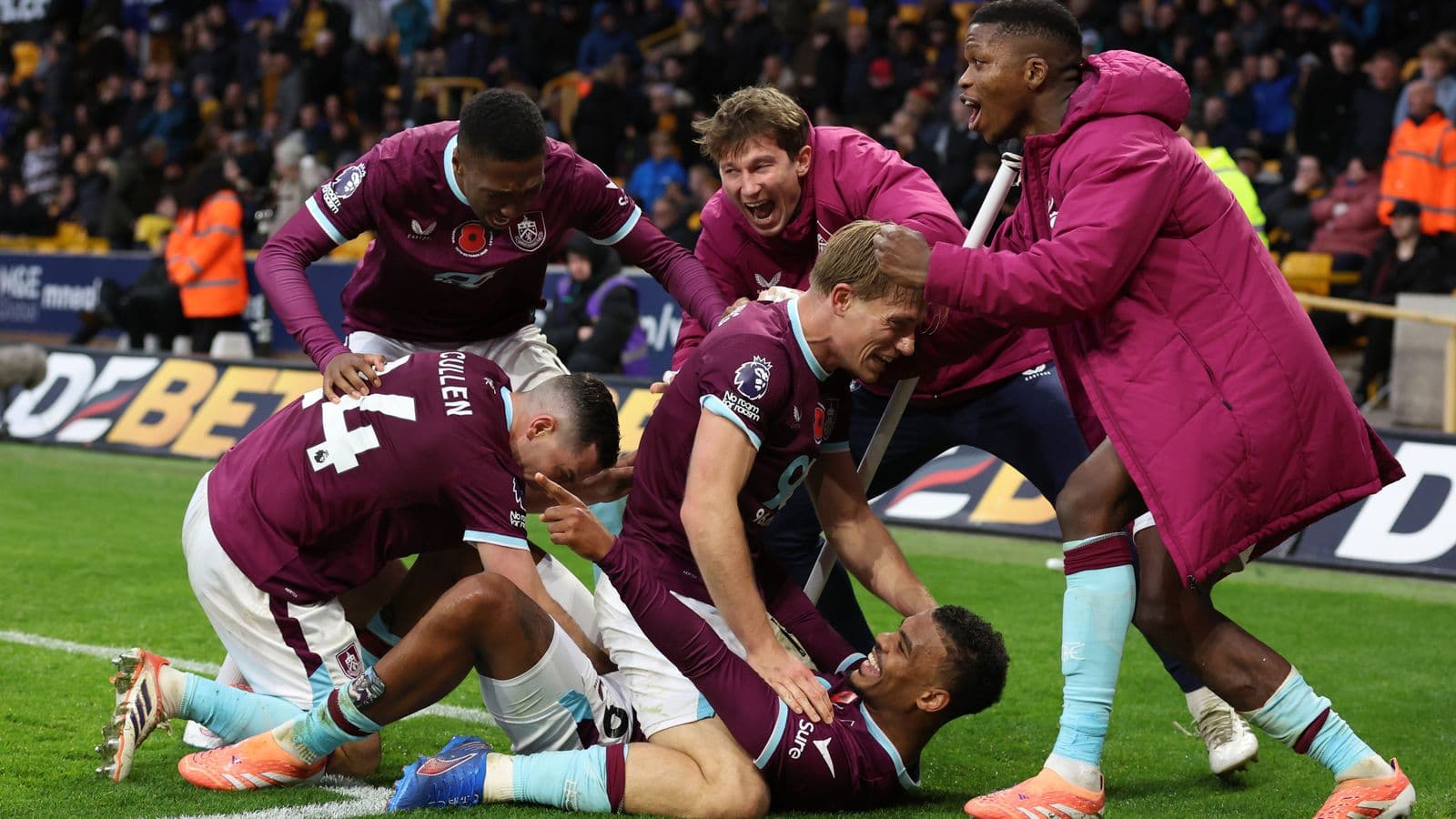 Burnley players celebrating a goal during match