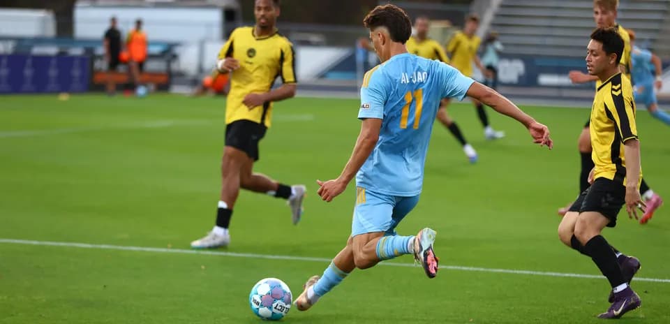 Player kicking the ball during JAX vs Charleston match