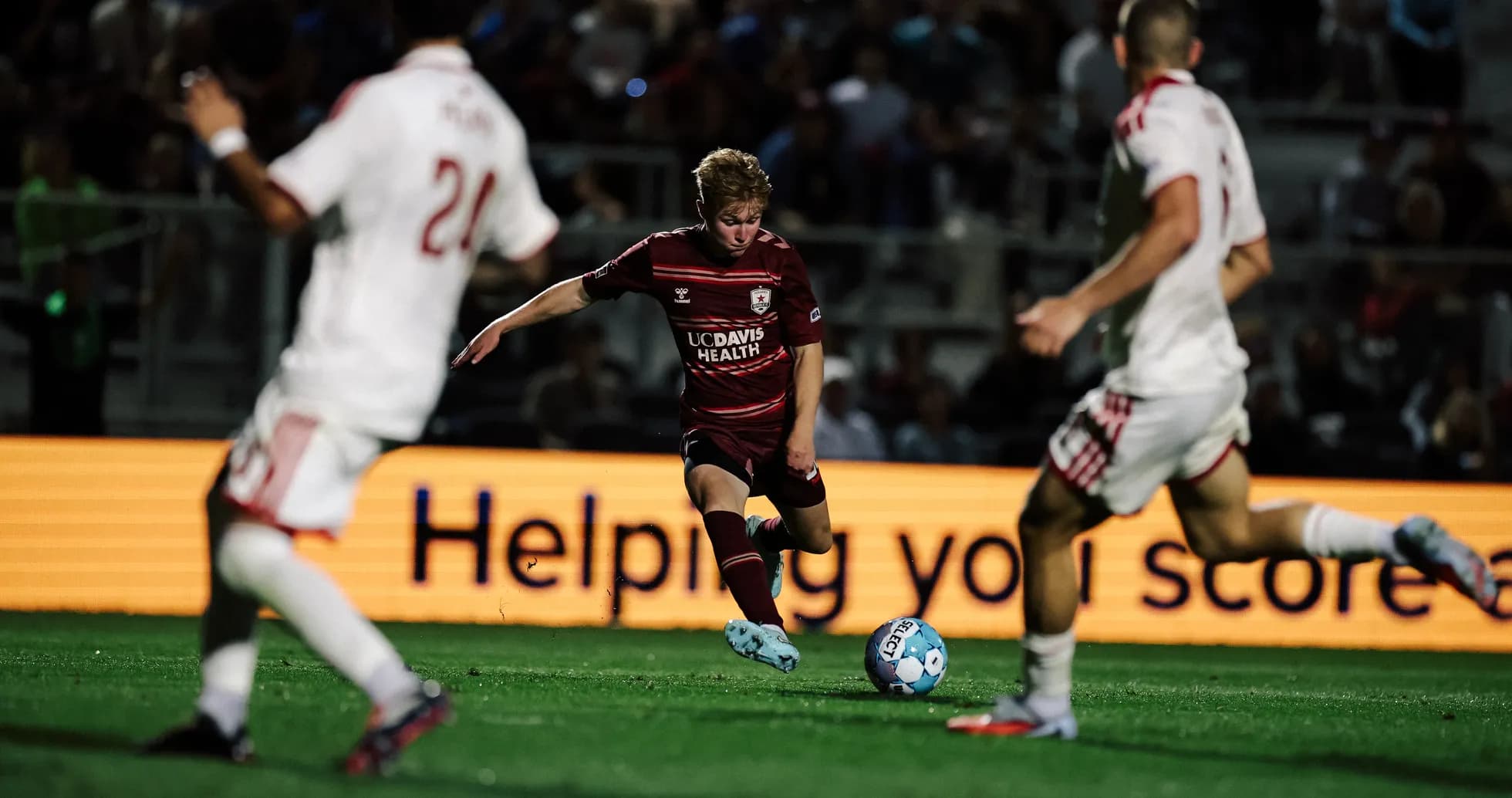 Player dribbling the ball during match