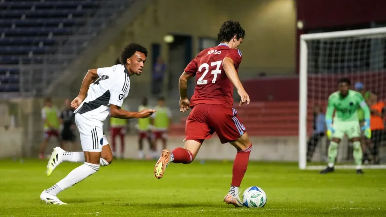 Chicago Fire II player dribbling past opponent