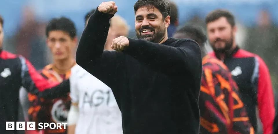 Coach celebrating with team during training session