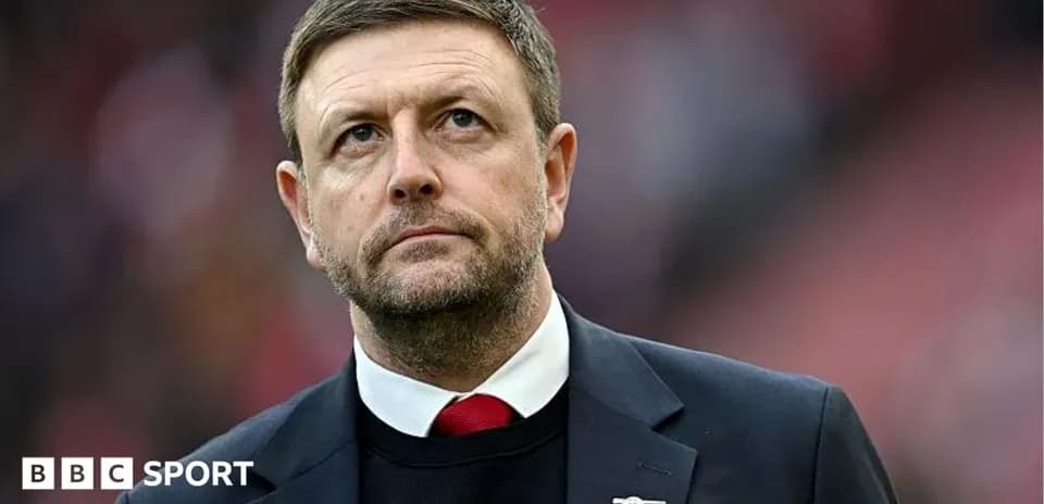 Manager observing the match from the sidelines