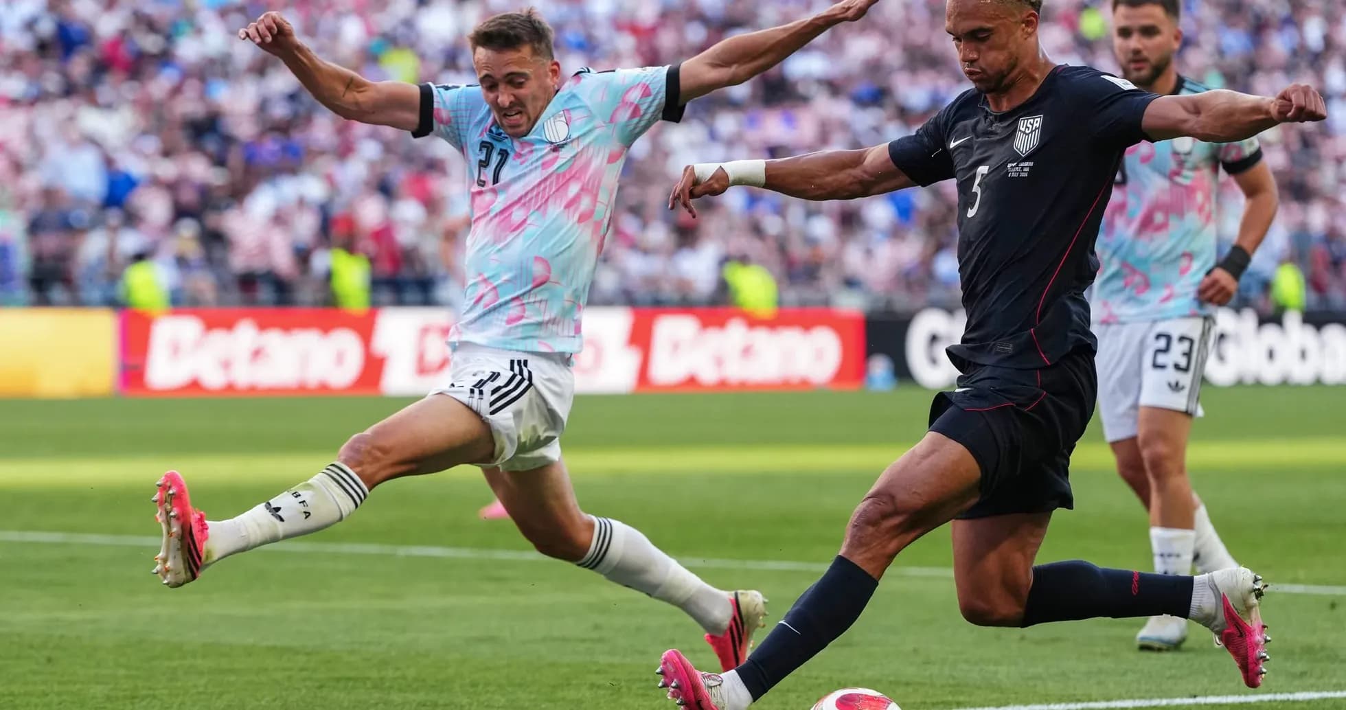 USA player kicking the ball during match