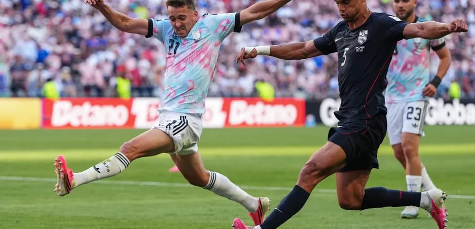 USA player kicking the ball during match