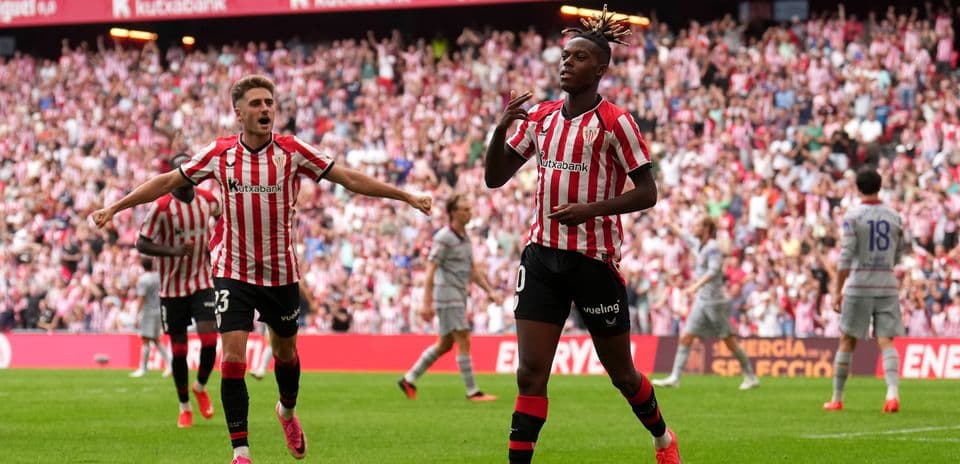 Athletic Bilbao player celebrating a goal in stadium