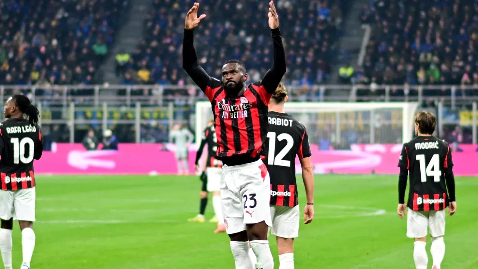 Player celebrating with teammates during a match