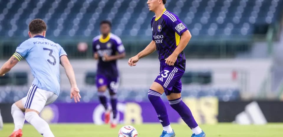 Orlando City II player dribbling ball during match
