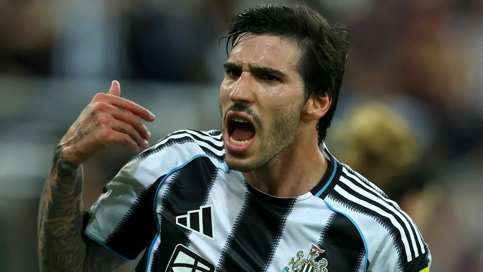 Player celebrating passionately after scoring a goal