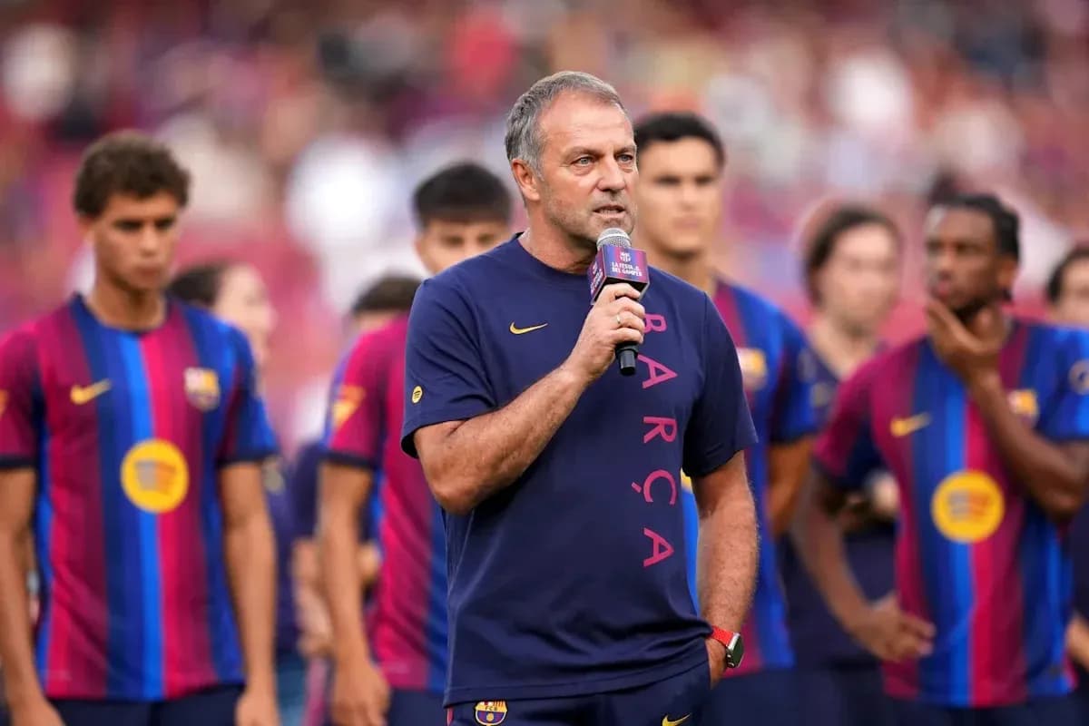Coach speaking at Barcelona team presentation event