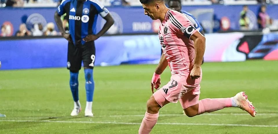 Player taking a penalty kick during match
