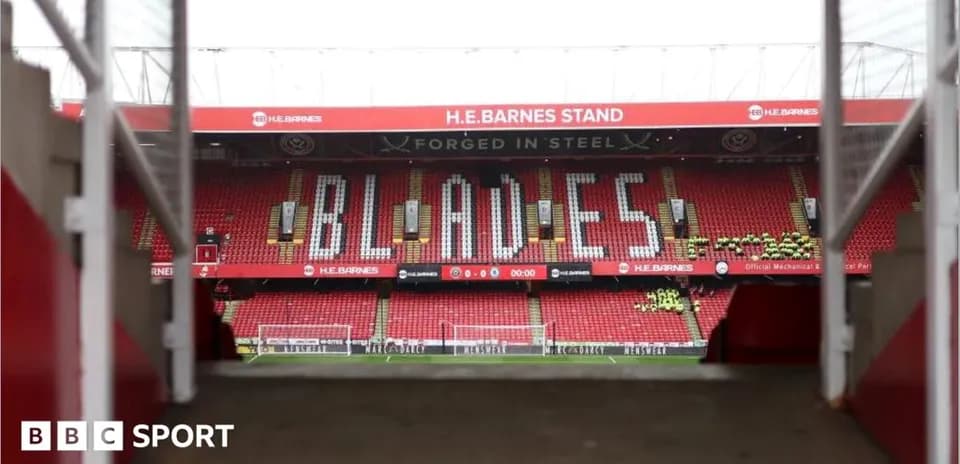 H.E. Barnes Stand with 'BLADES' displayed in seats