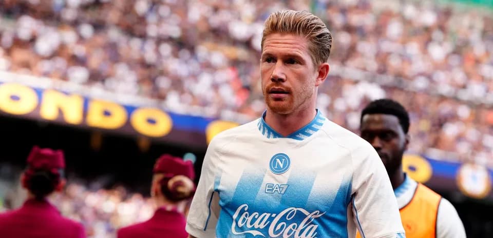 Player entering the field wearing Napoli kit