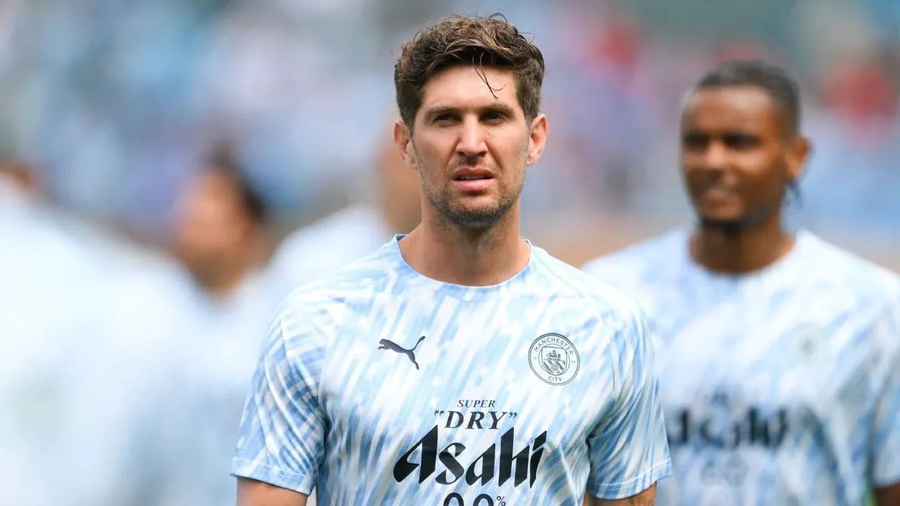 Player in Manchester City training kit on field