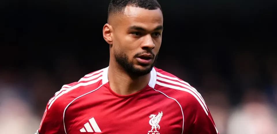 Player in Liverpool FC kit during match action