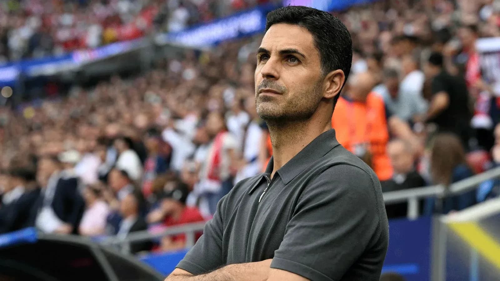 Manager observing the match from the sidelines