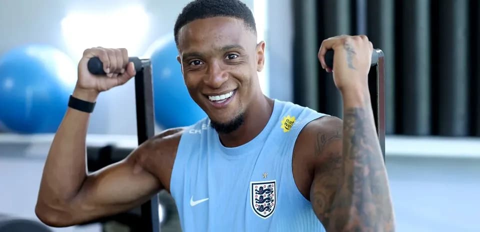 Player exercising with weights in training session