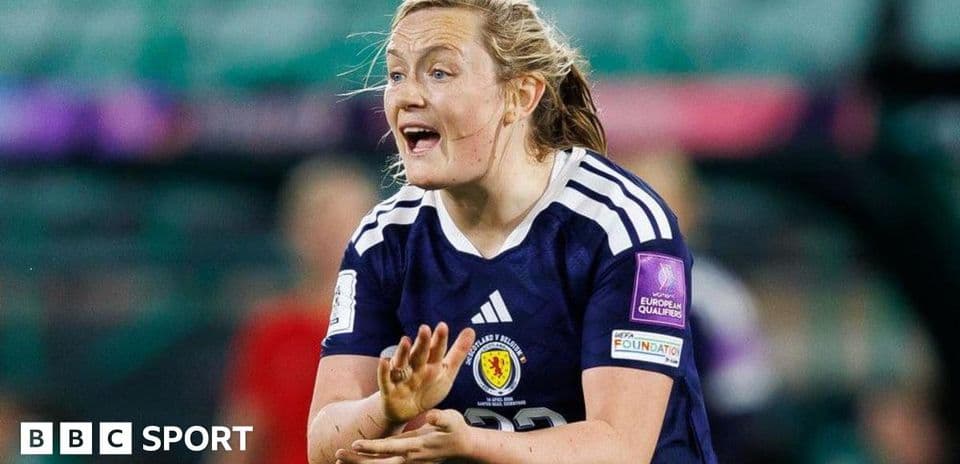 Player gesturing during a women's football match