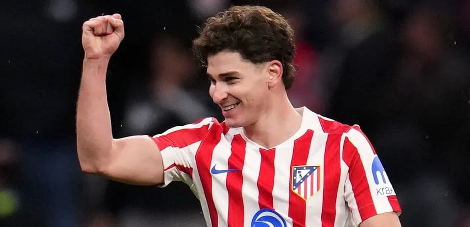 Player celebrating after scoring a goal for Atlético Madrid