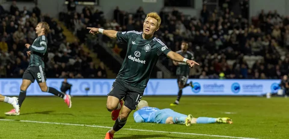 Player celebrating a goal on the pitch