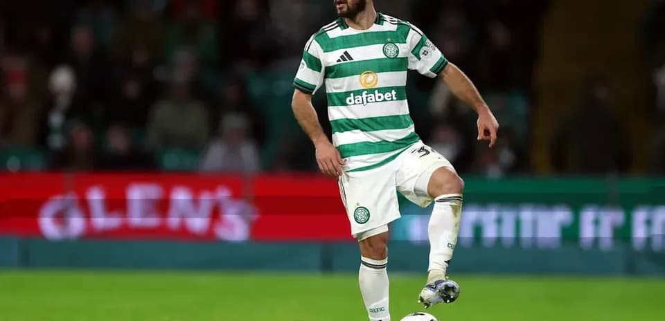 Celtic player controlling the ball on the pitch
