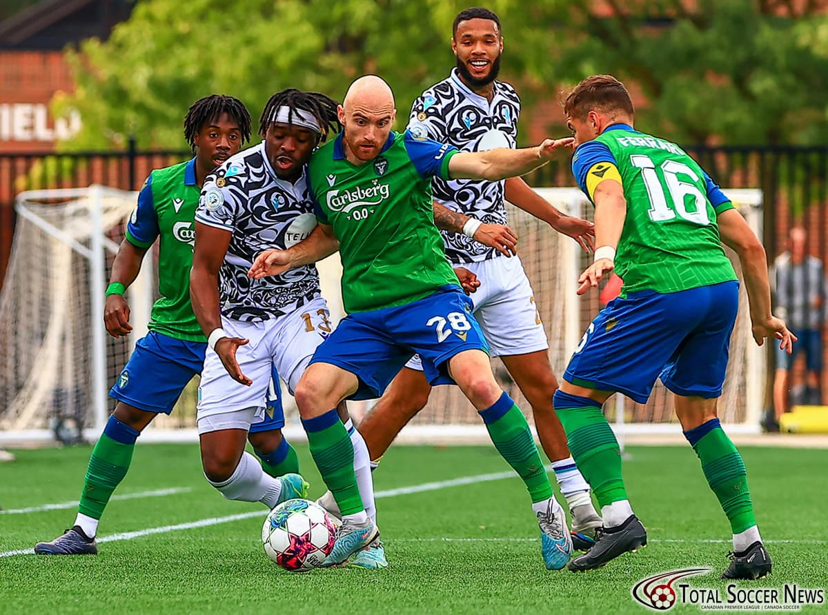 Pacific FC player battling for the ball
