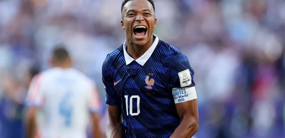 Player celebrating during international football match