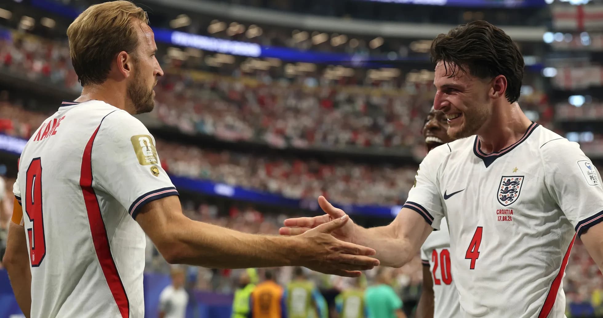 Harry Kane and Declan Rice celebrating on field