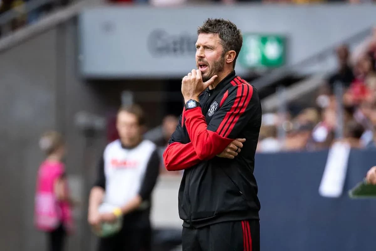 Coach observing the match from the sidelines