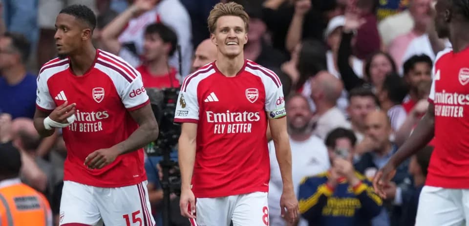 Arsenal players celebrating during match against Chelsea