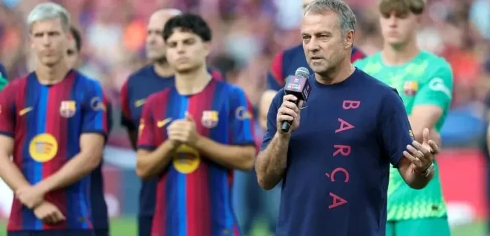 Manager speaking with players during team presentation event