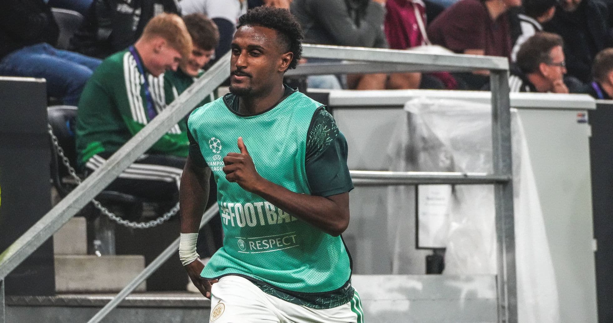 Player warming up on the sidelines during match