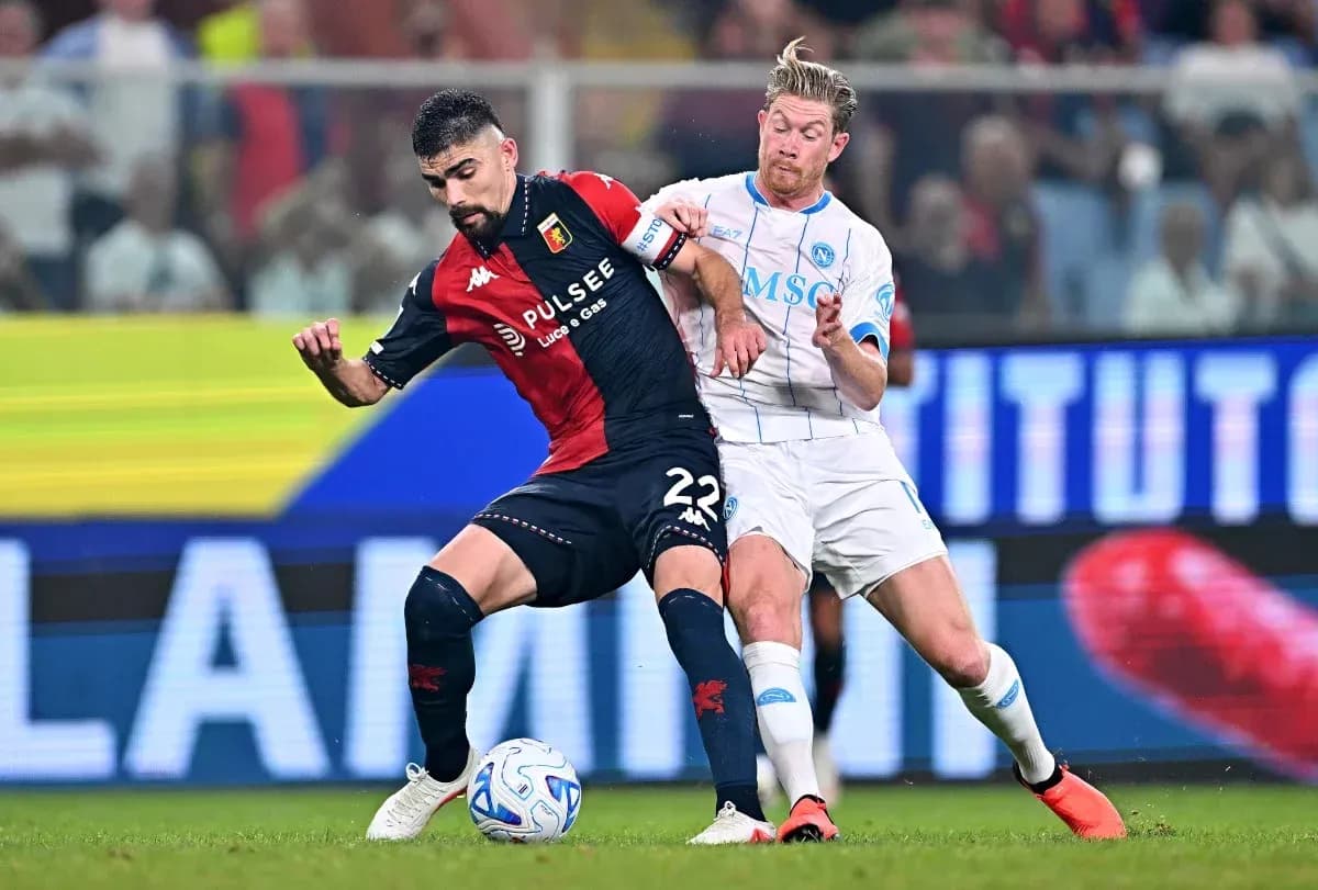 Two players contesting the ball during a match