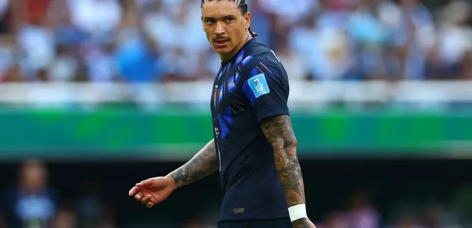 Player in blue jersey on the field during match