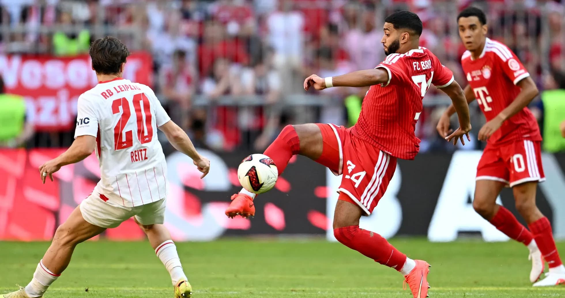 Player from FC Bayern kicking the ball during match