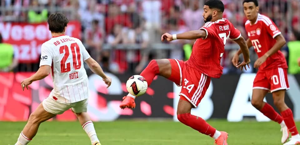 Player from FC Bayern kicking the ball during match