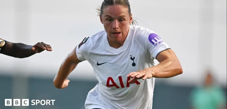 Player in Tottenham kit sprinting during match