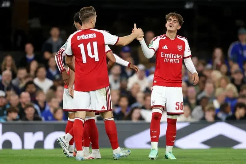 Arsenal players celebrating during a match