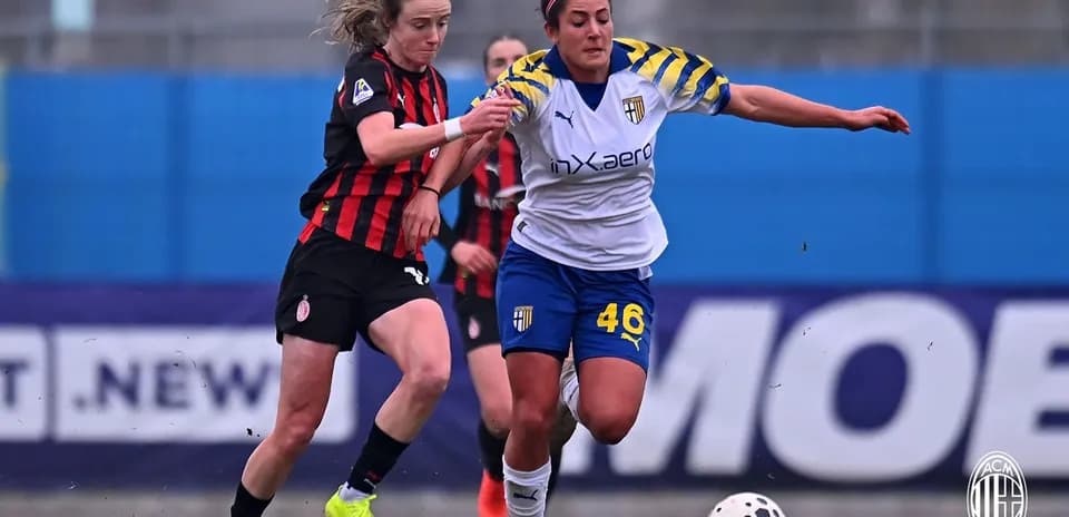 AC Milan and Parma players contesting for the ball