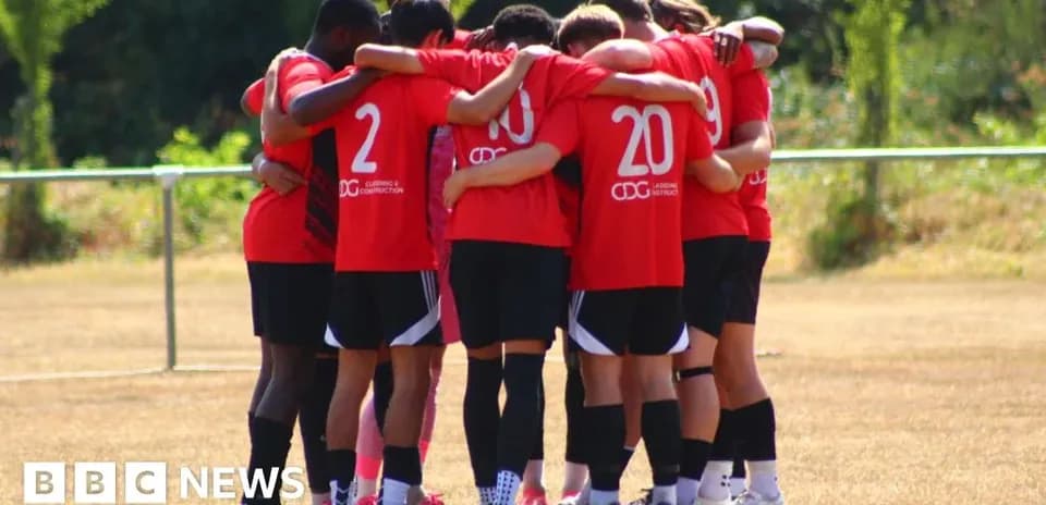 Players huddled together before training session