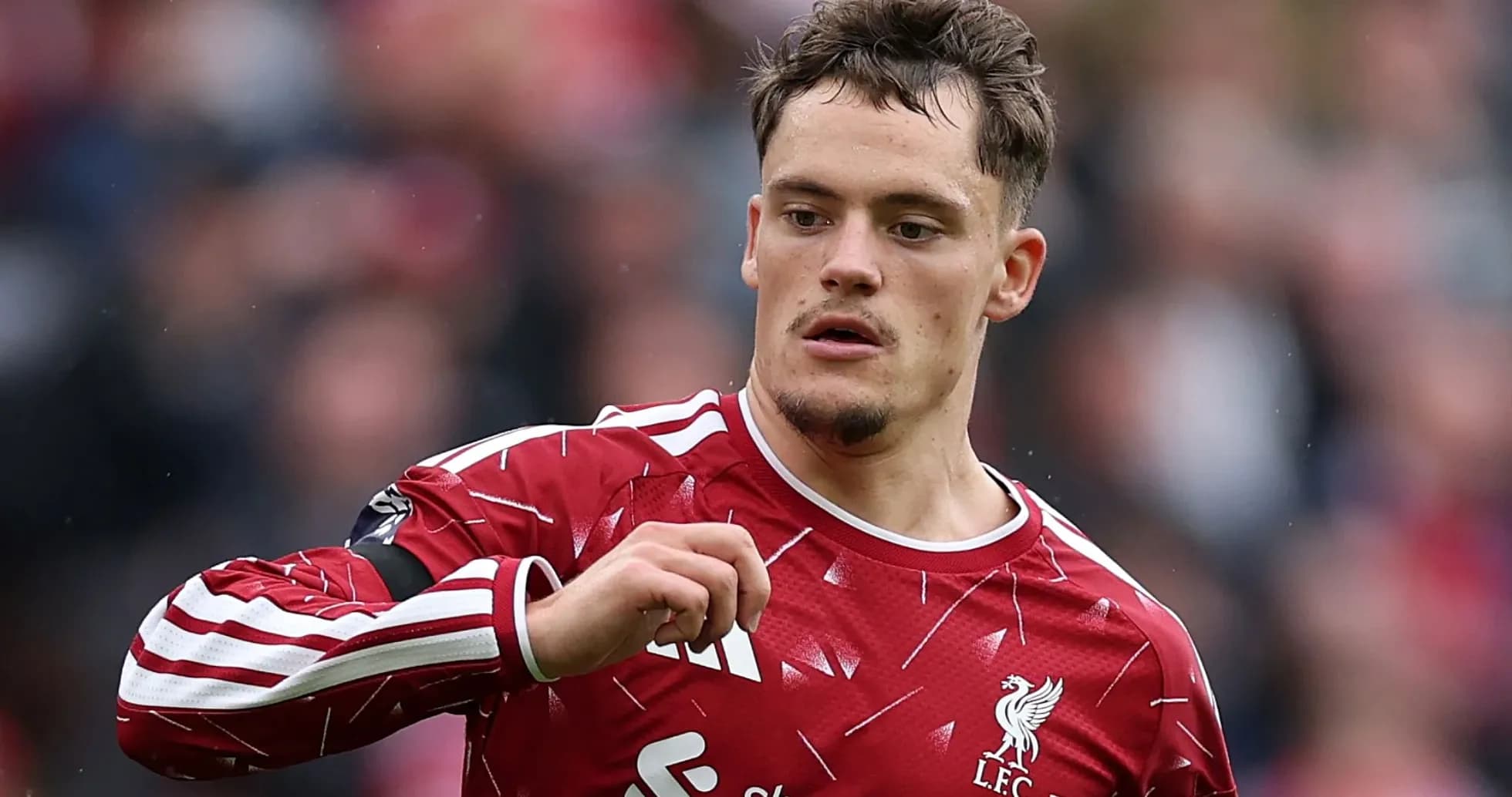 Player in Liverpool kit during match action