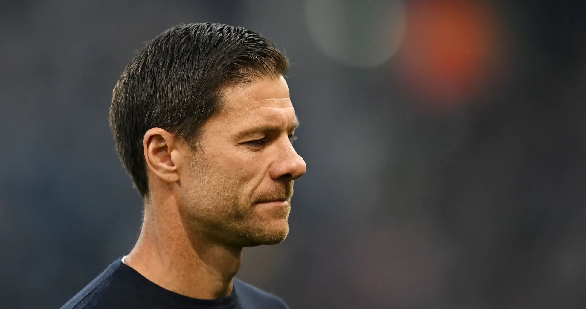 Coach looking thoughtful during match preparations