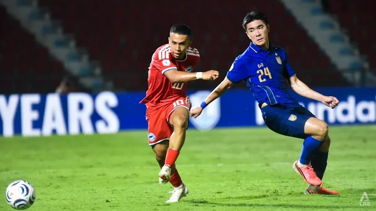Player 10 dribbling past defender 24 during match