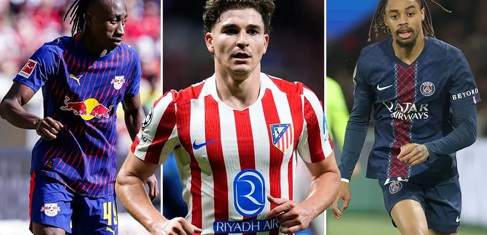 Three football players in club jerseys posing together