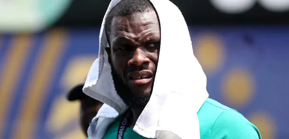 Player with towel on head during training session
