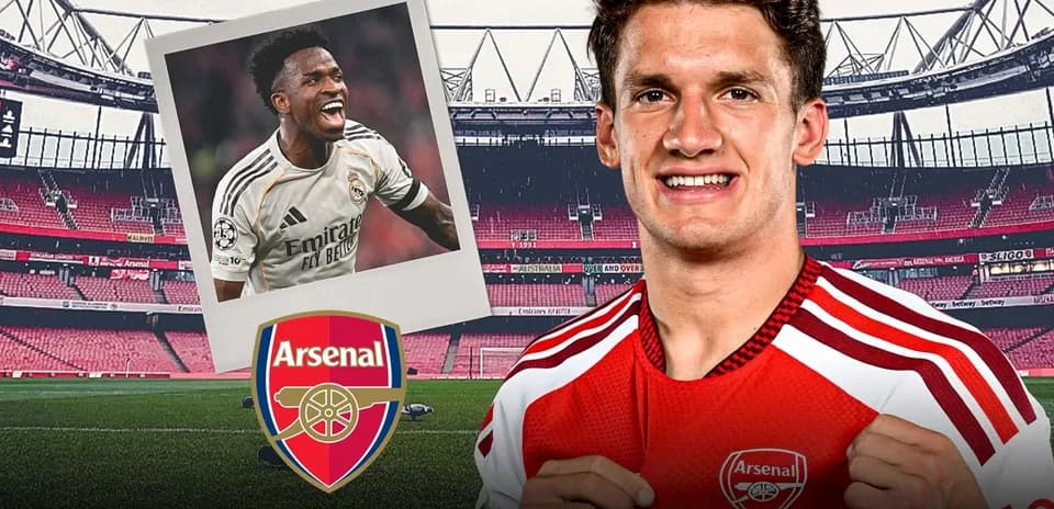 Arsenal player posing with club logo at Emirates Stadium