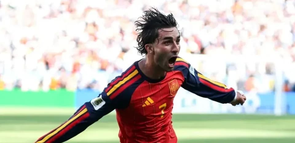 Player celebrating a goal in Spain jersey