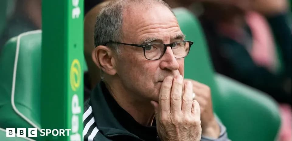 Coach watching the match from the sidelines
